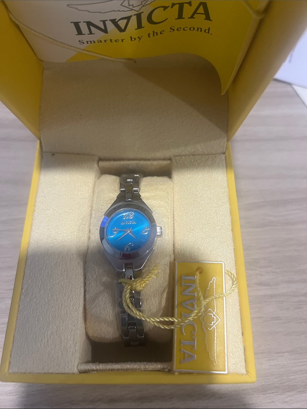 Invicta Women's Silver Watch with Bright Blue Dial